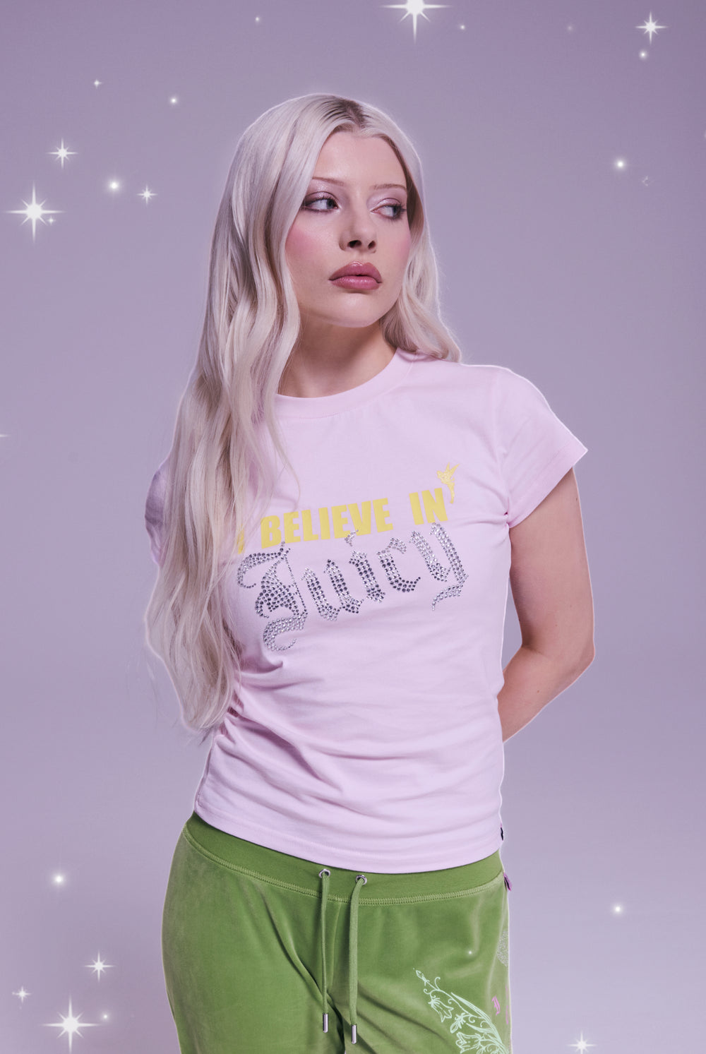 Displays a model wearing the Disney Cherry Blossom 'Juicy' branded believes in juicy tee 