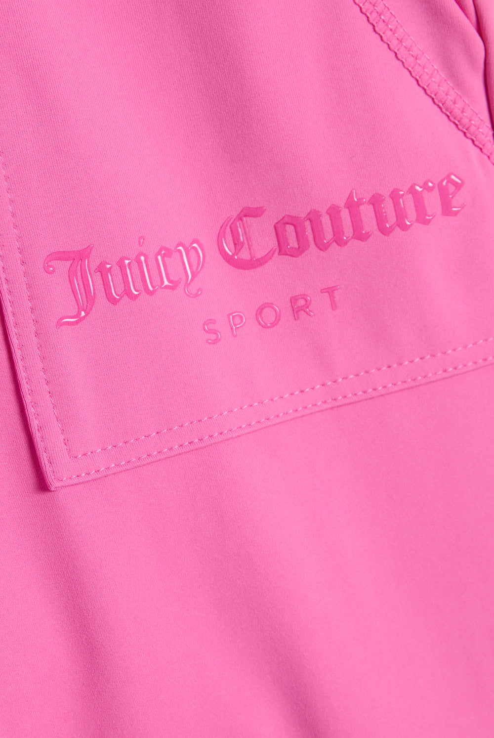 Displays the Wild Orchid 'Juicy' branded active Low Rise Pant featuring the juicy couture sport branding 