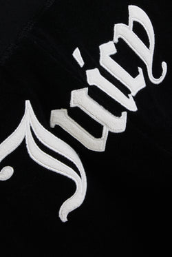 Displays the Black appliqué 'Juicy' branded Terry ultra low straight track pants featuring the juicy branding 