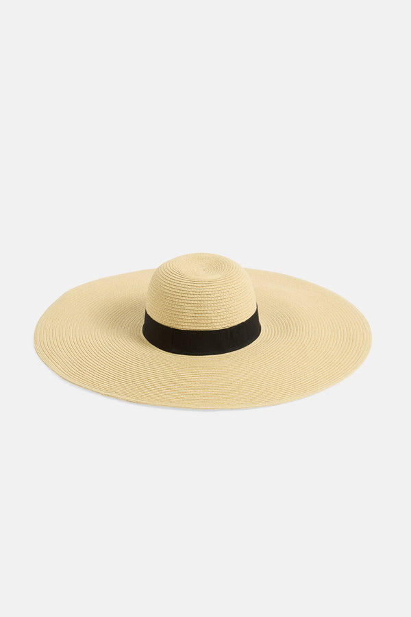 Displays a Natural 'Juicy' branded Floppy straw hat 