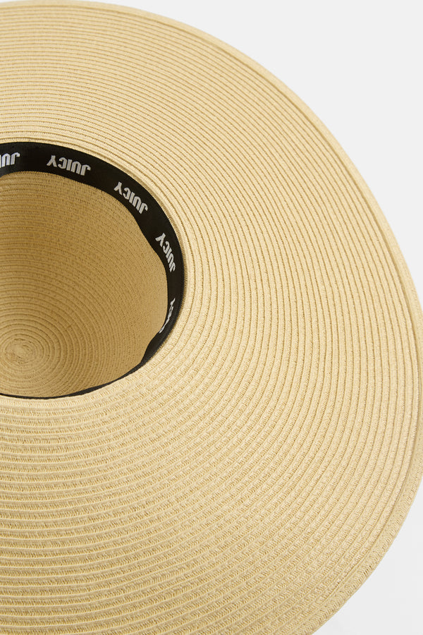 Displays a Natural 'Juicy' branded Floppy straw hat 