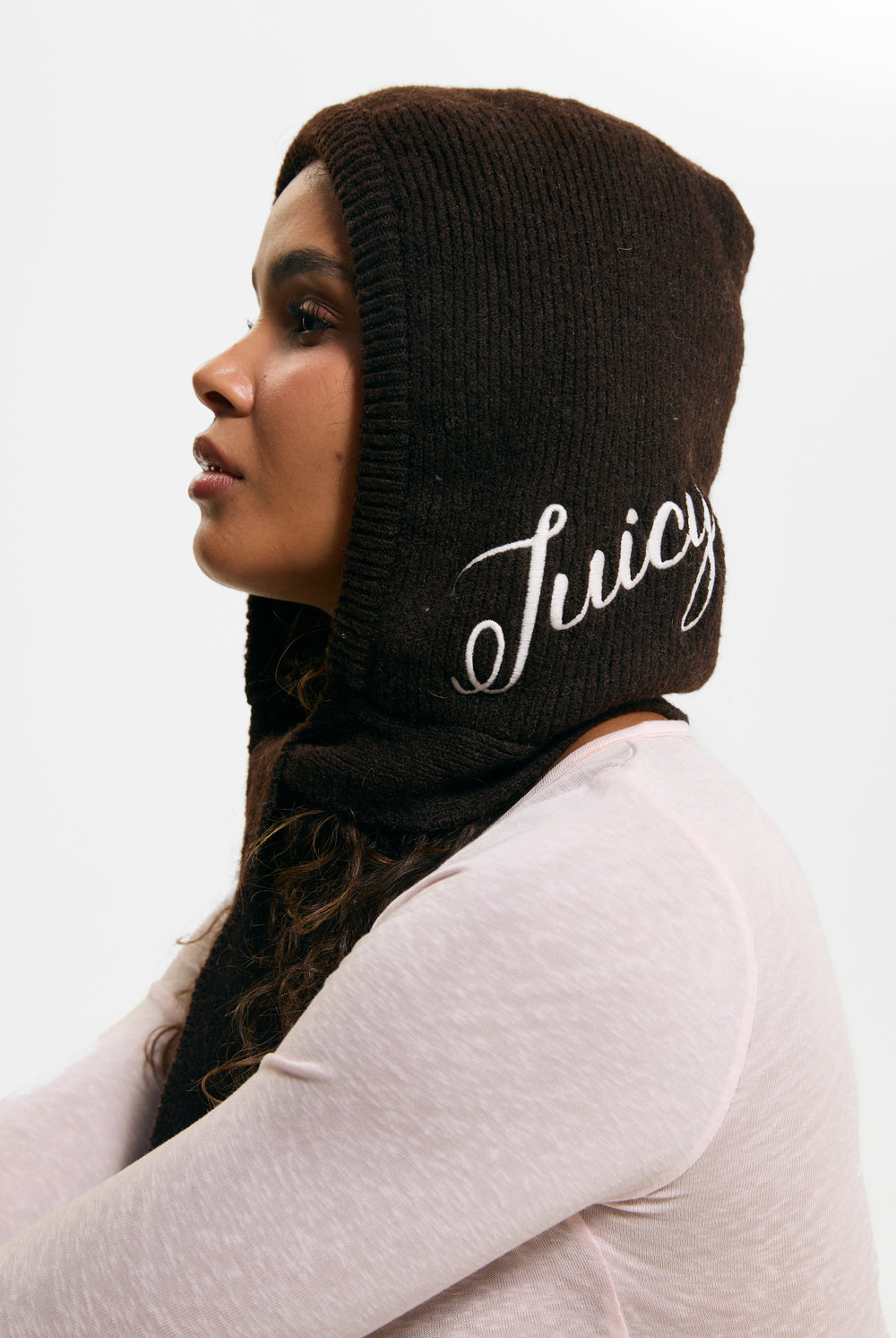 Displays a model wearing the Java 'Juicy' branded Bonnet With Bow