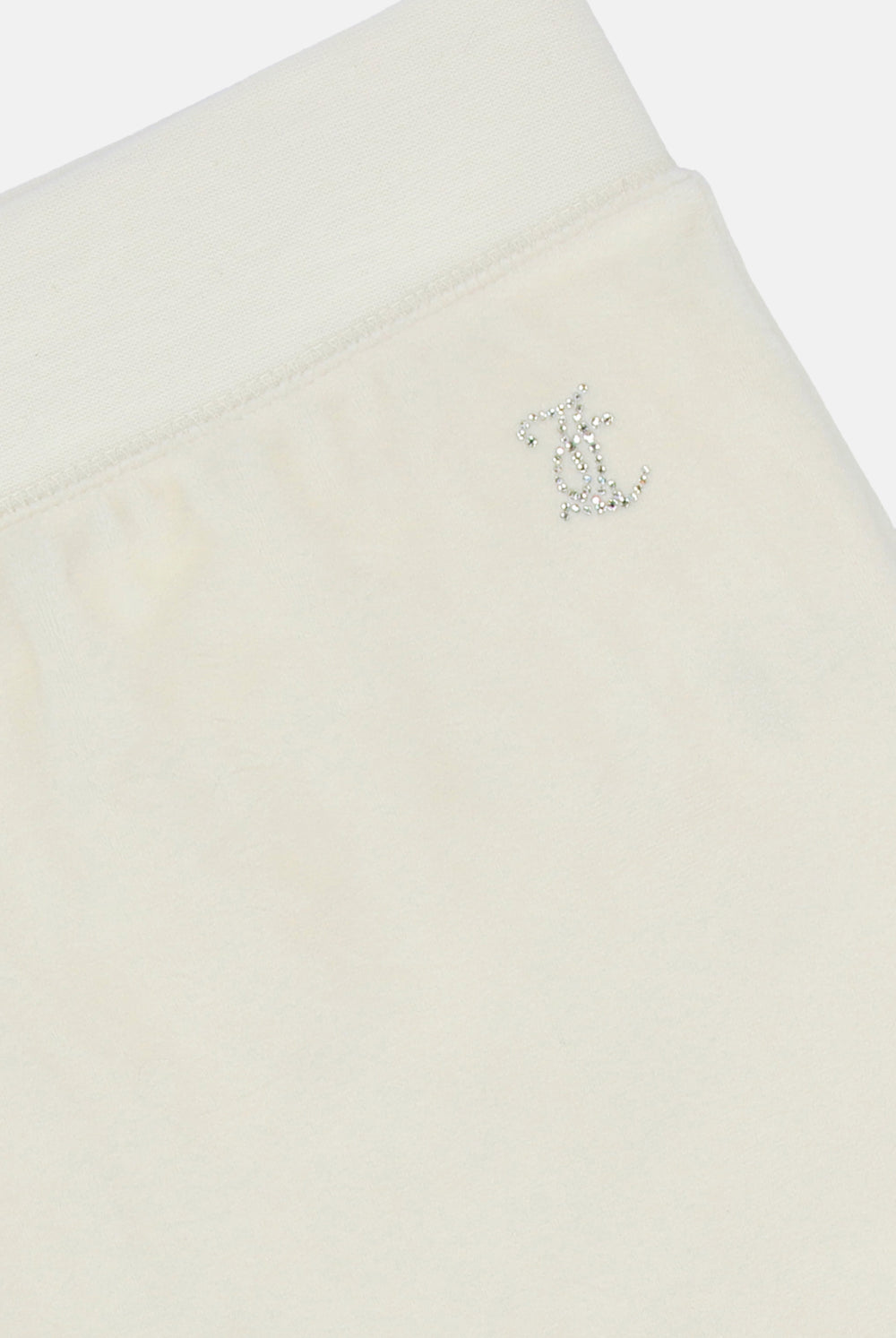 Displays the marshmallow 'Juicy' branded bridesmaid classic velour low rise track pants featuring the juicy Couture logo