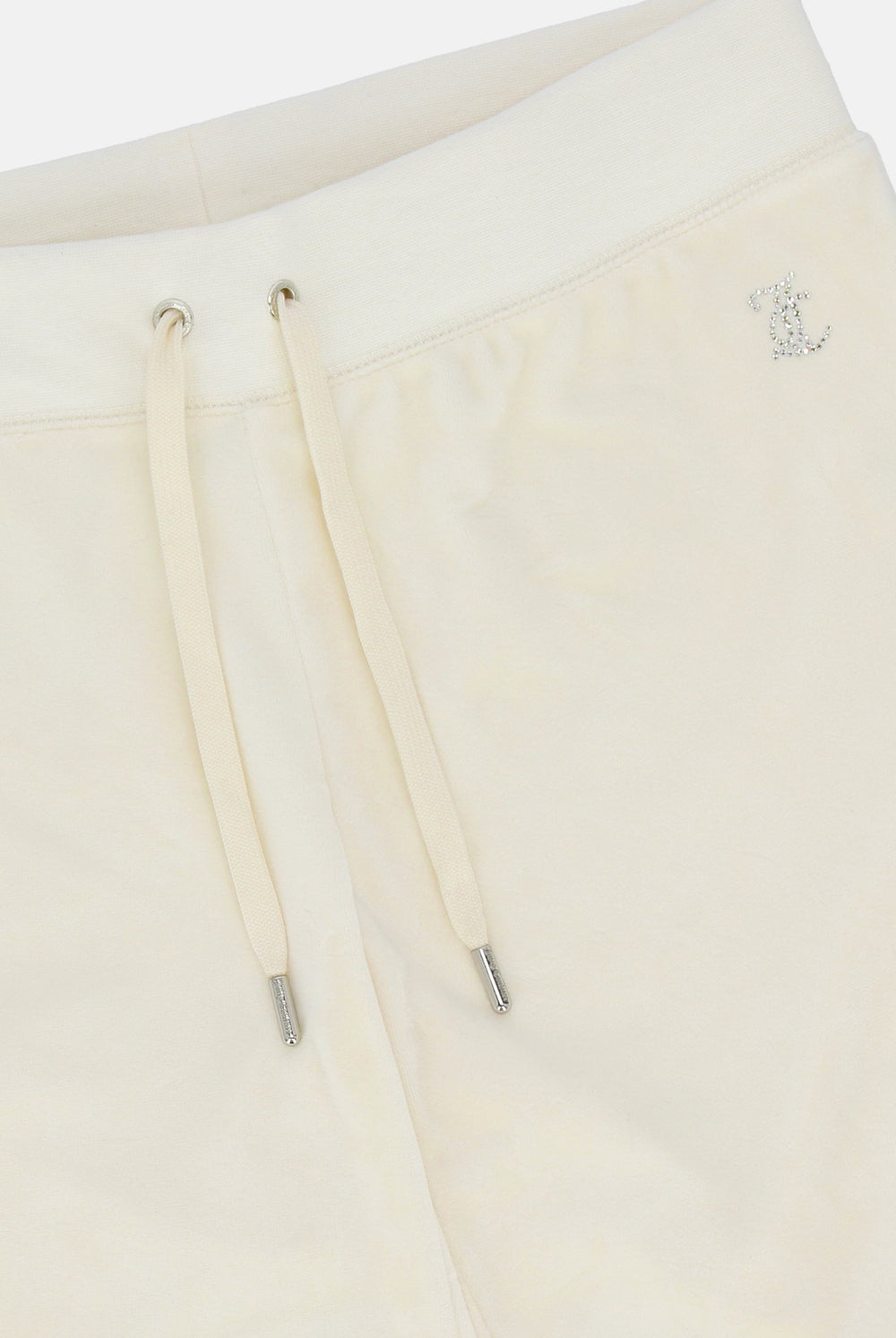 Displays the marshmallow 'Juicy' branded bridesmaid classic velour low rise track pants featuring the details featuring the juicy Couture branding 