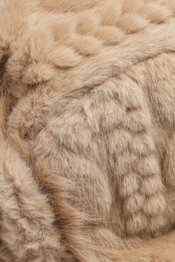 Displays the Warm Taupe 'Juicy' branded Cable Knit Trapper With Fur Lining featuring close up on the details