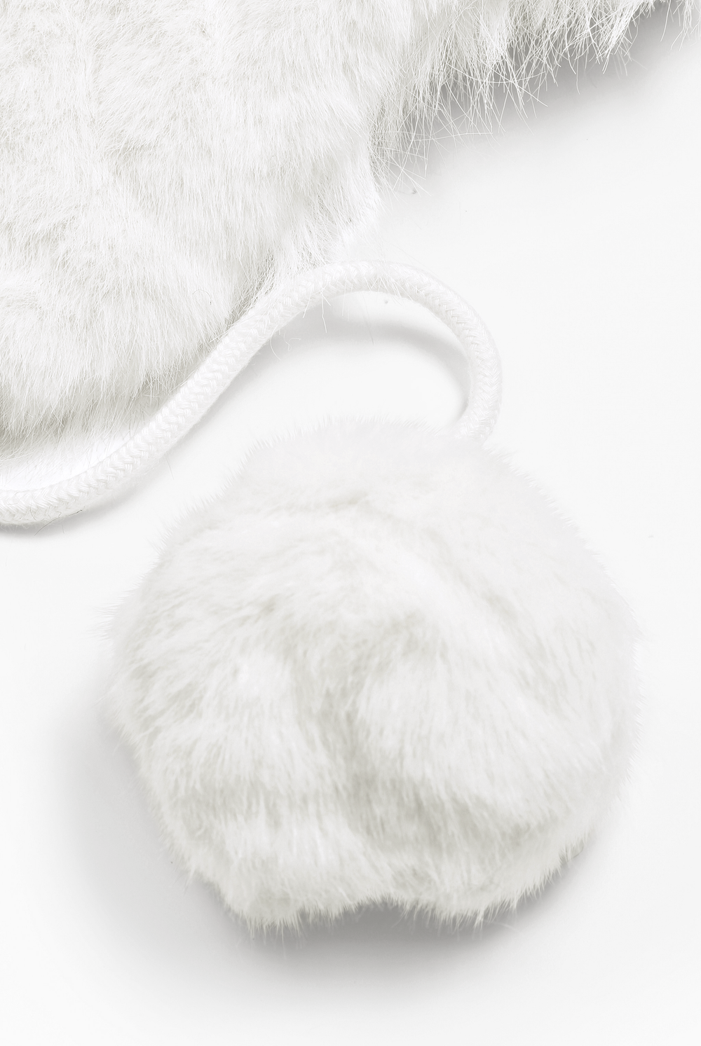 Displays the Sugar Swizzle 'Juicy' branded Cable Knit Trapper With Fur Lining featuring the close up on the details 