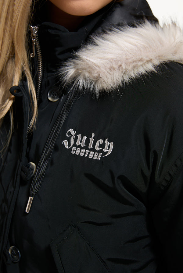 Displays a model wearing the Black 'Juicy' branded Nylon Bomber