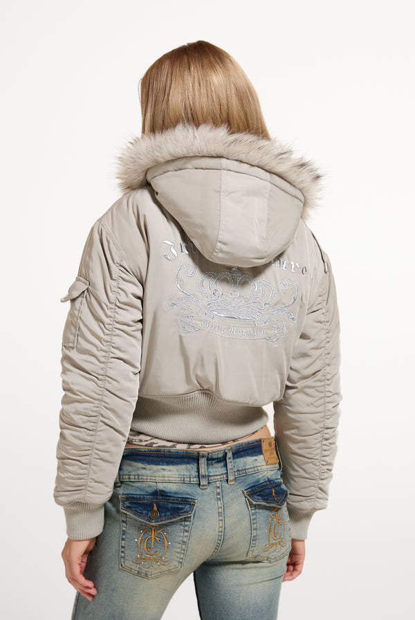 Displays a model wearing the String 'Juicy' branded Nylon Bomber