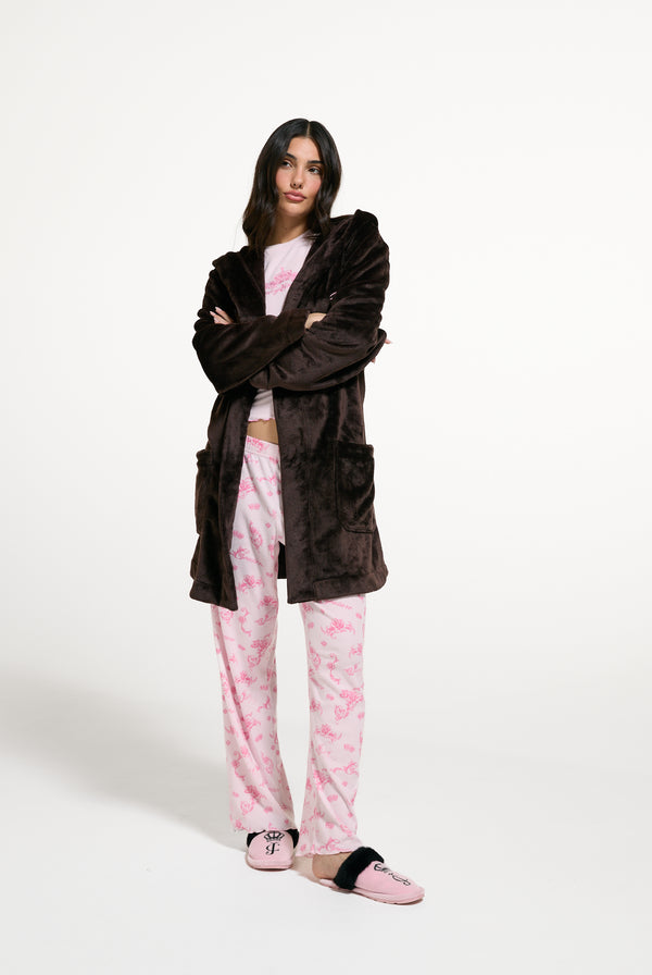 Displays a model wearing the Java 'Juicy' branded crown plush hooded robe 