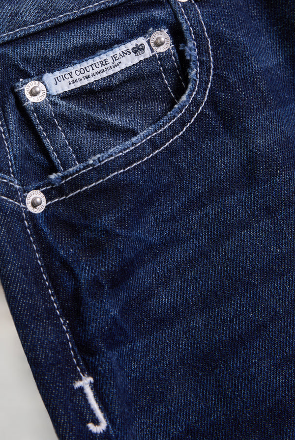 Displays the mid Wash 'Juicy' branded wide leg Diamanté jeans 