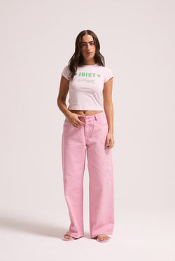 Displays a model wearing the Pink Wash 'Juicy' branded Diamanté wide leg jeans 