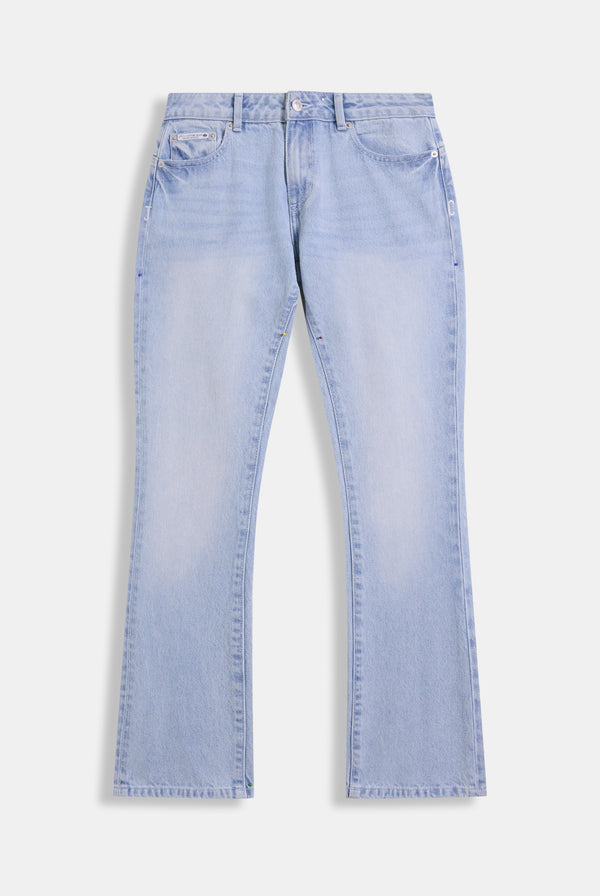 Displays the Light Wash 'Juicy' branded Dog crest bootcut jeans
