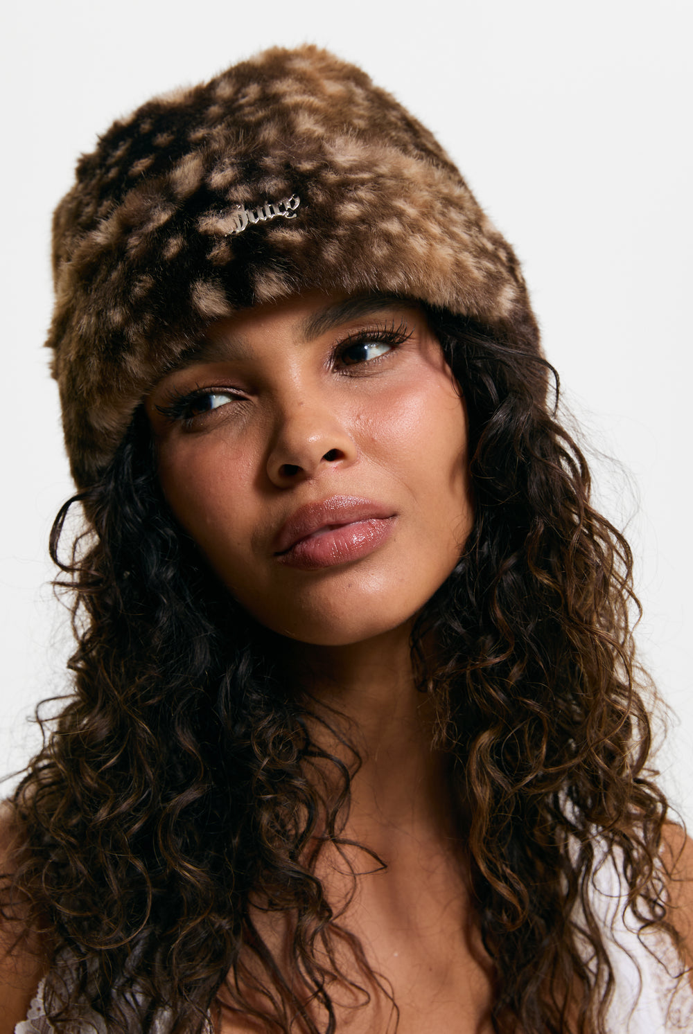 Displays a model wearing the Bambi Print 'Juicy' branded Faux Fur Hat