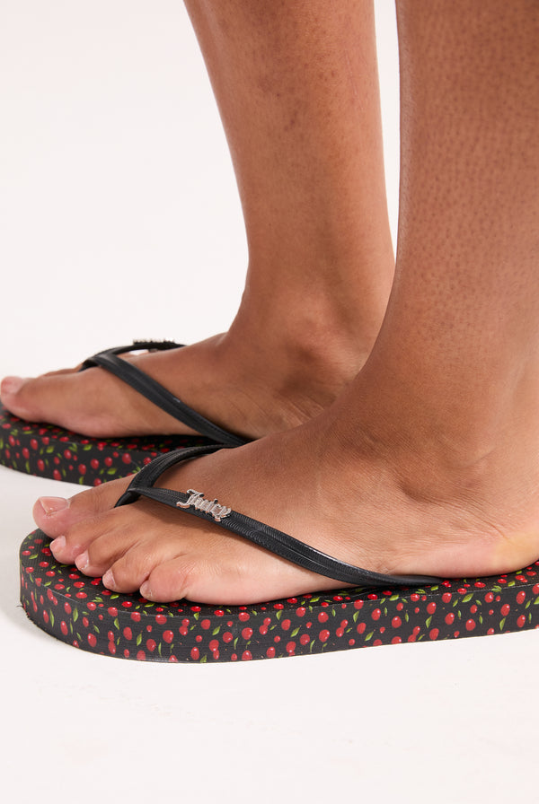 Displays a Black Cherry Print 'Juicy' branded platform flip flop