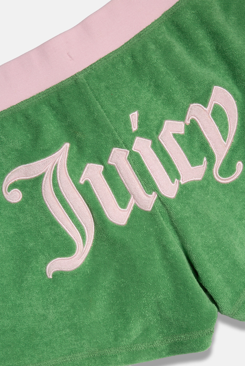 Displays the Peppermint Appliqué 'Juicy' branded Terry booty shorts featuring the juicy branding 