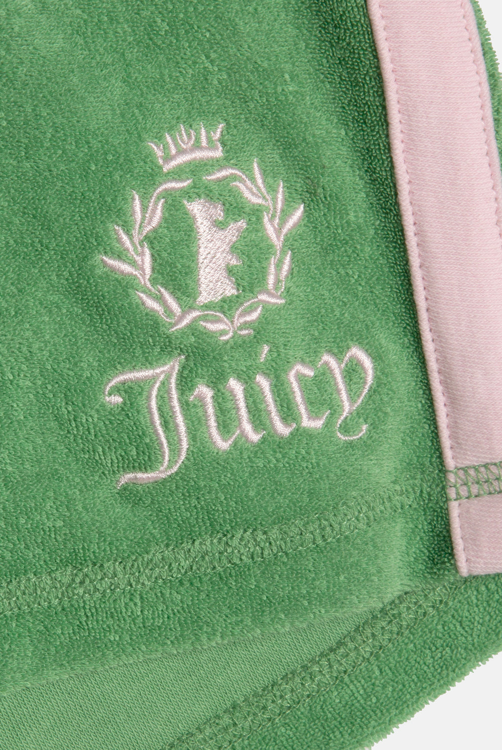 Displays the Peppermint Appliqué 'Juicy' branded Terry booty shorts featuring the Juicy Couture logo