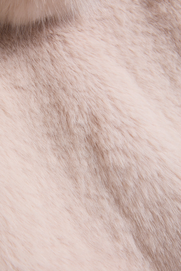Displays the cream hooded 'Juicy' branded faux fur jacket 