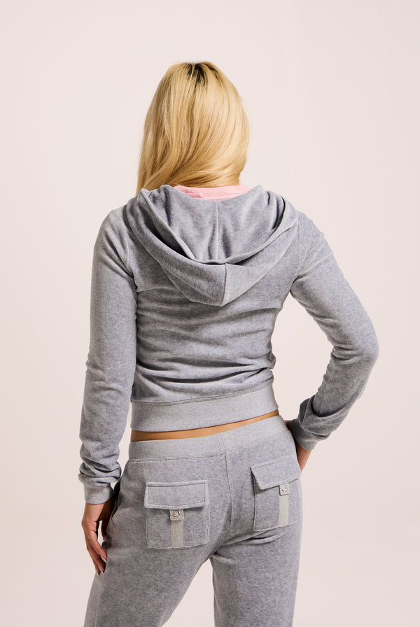 Displays a model wearing the Silver Marl 'Juicy' branded bamboo velour heritage hoodie 