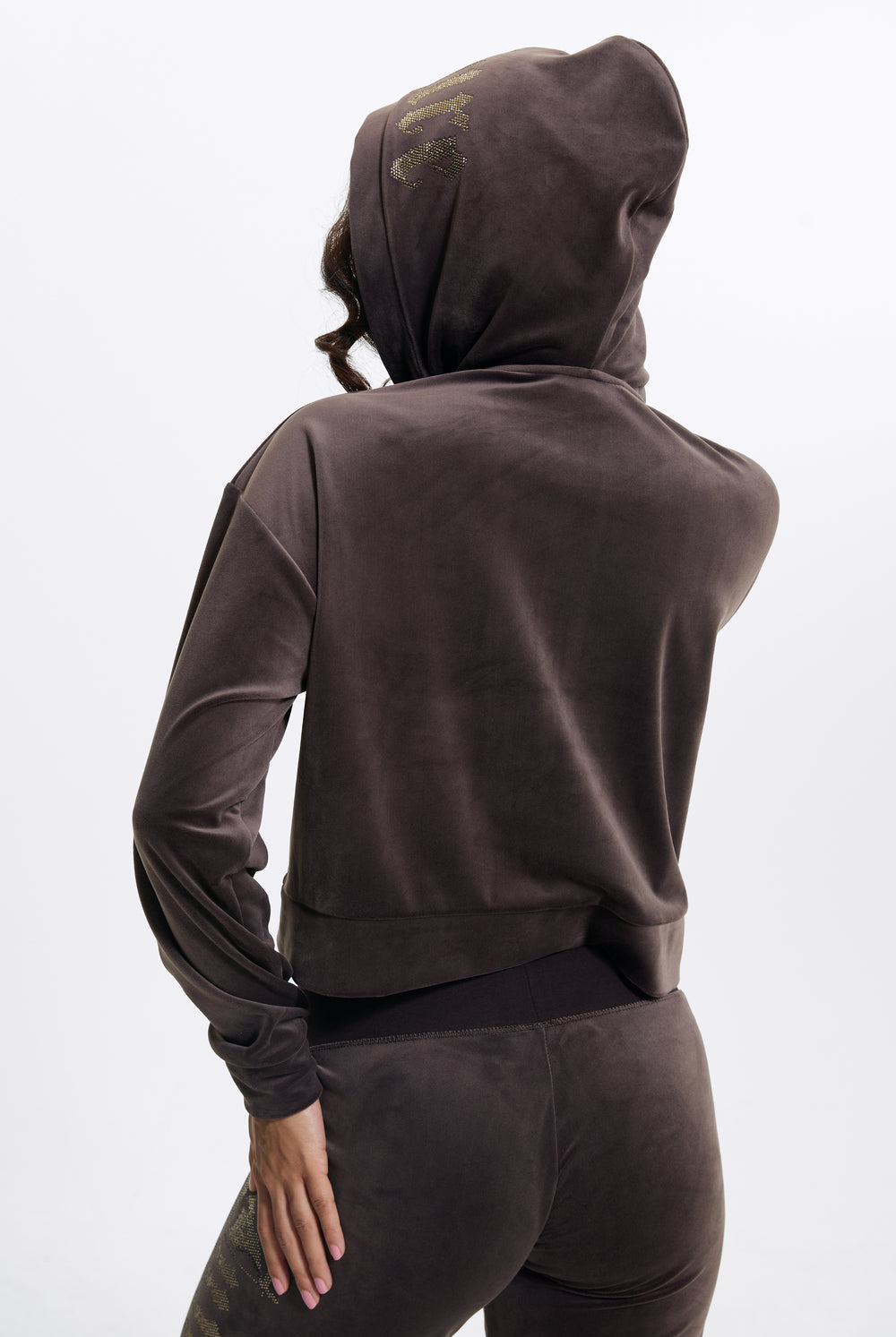 Displays a model wearing the Java 'Juicy' branded Old Gothic Oversized Cropped Hoodie