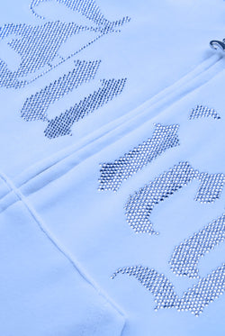 Displays the Powder Blue 'Juicy' branded Old Gothic Oversized Cropped Hoodie featuring the juicy branding details