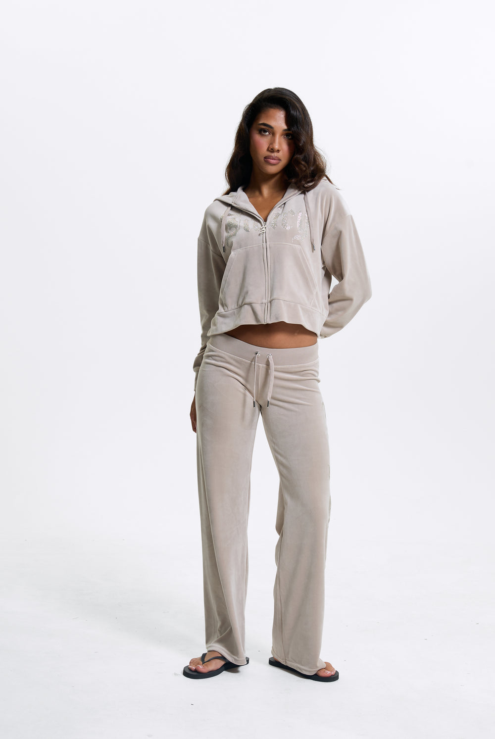 Displays a model wearing the String 'Juicy' branded Old Gothic Diamante Og Straight Leg Trackpant