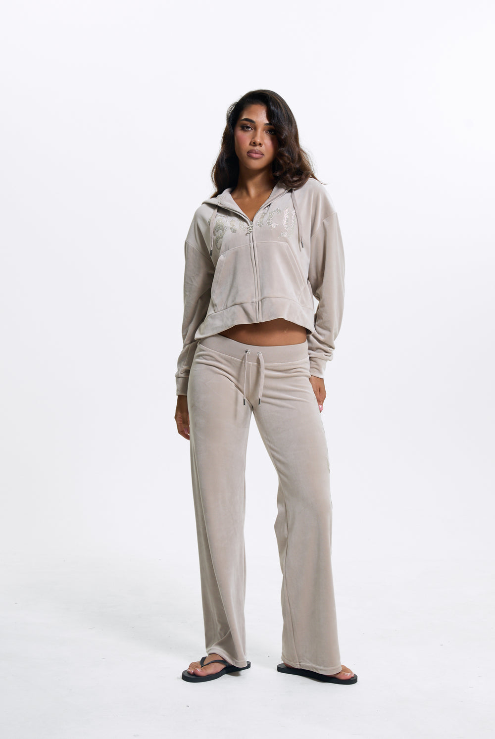 Displays a model wearing the String 'Juicy' branded Old Gothic Diamante Og Straight Leg Trackpant