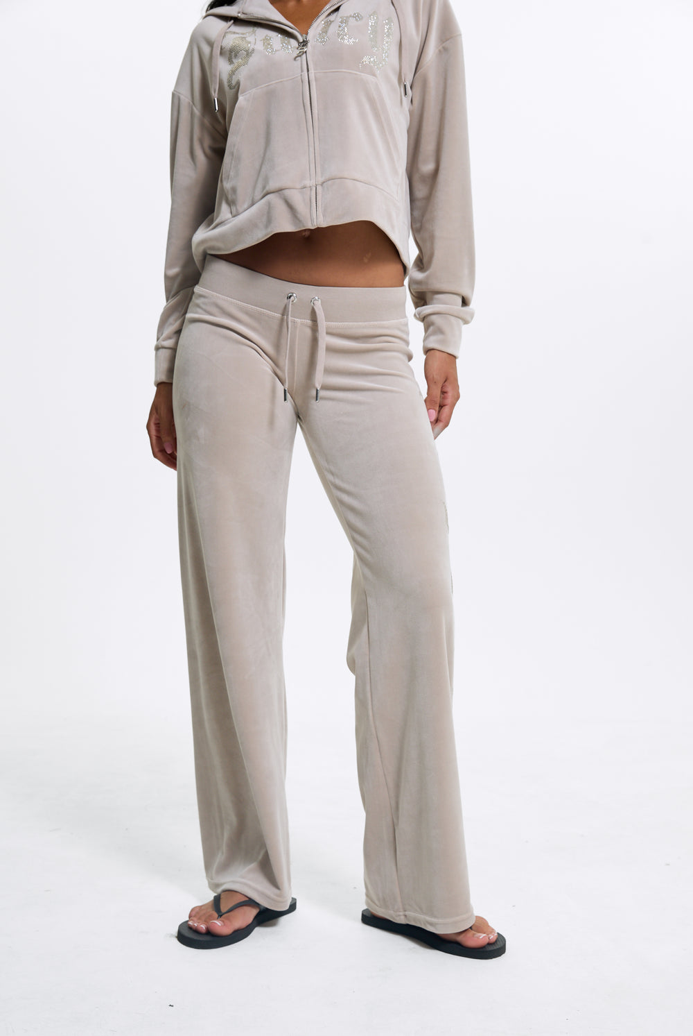 Displays a model wearing the String 'Juicy' branded Old Gothic Diamante Og Straight Leg Trackpant