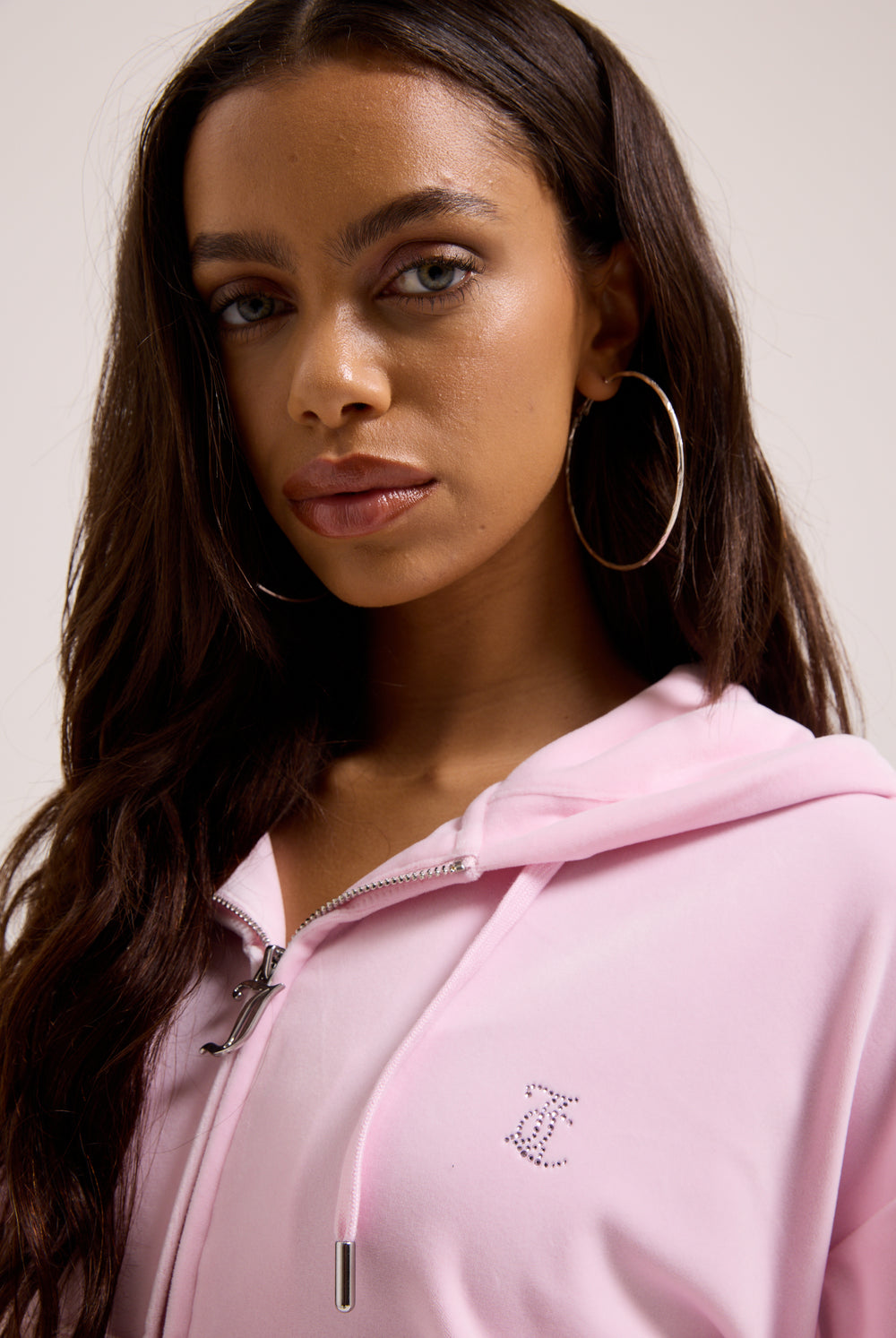 Displays a model wearing the Cherry Blossom 'juicy' branded outline diamanté oversized cropped velour hoodie 
