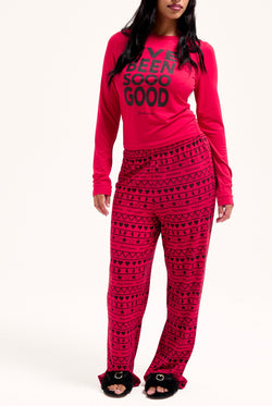 Displays a model wearing the toreador 'Juicy' I've been good pyjama set 