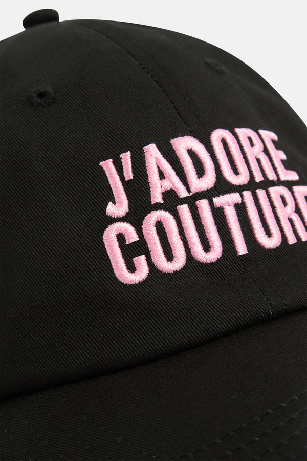 Displays the Black 'Juicy' branded J'Adore Couture cap featuring the juicy branding 