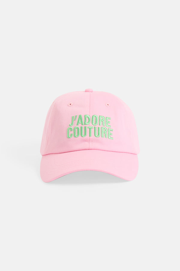 Displays the Begona Pink 'Juicy' branded J'ADORE COUTURE cap 