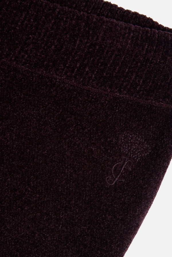 Displays the Winetasting 'Juicy' branded Luxe Knit Straight Leg Pant featuring the juicy branding 