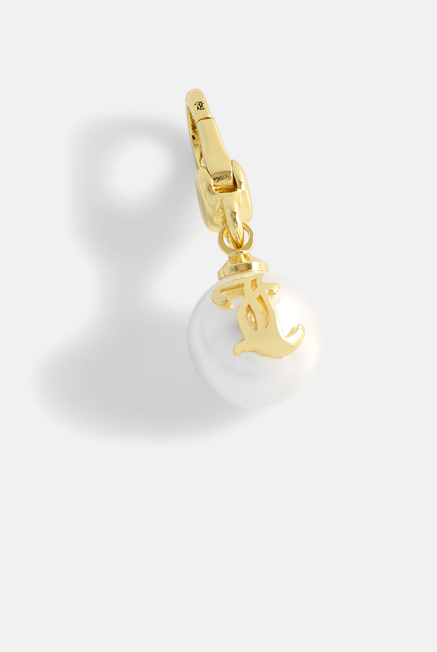 Displays the Gold 'Juicy' branded JC Pearl Charm
