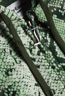 Displays the Green snake print 'Juicy' branded diamanté oversized cropped hoodie featuring the juicy zip 