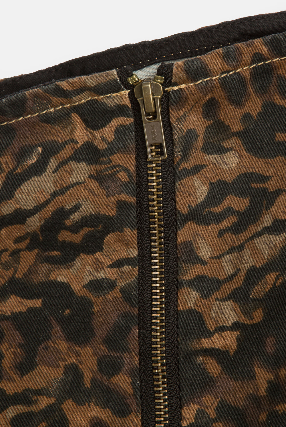 Displays the Animal 'Juicy' branded denim bandeau mini dress featuring the details on the zip