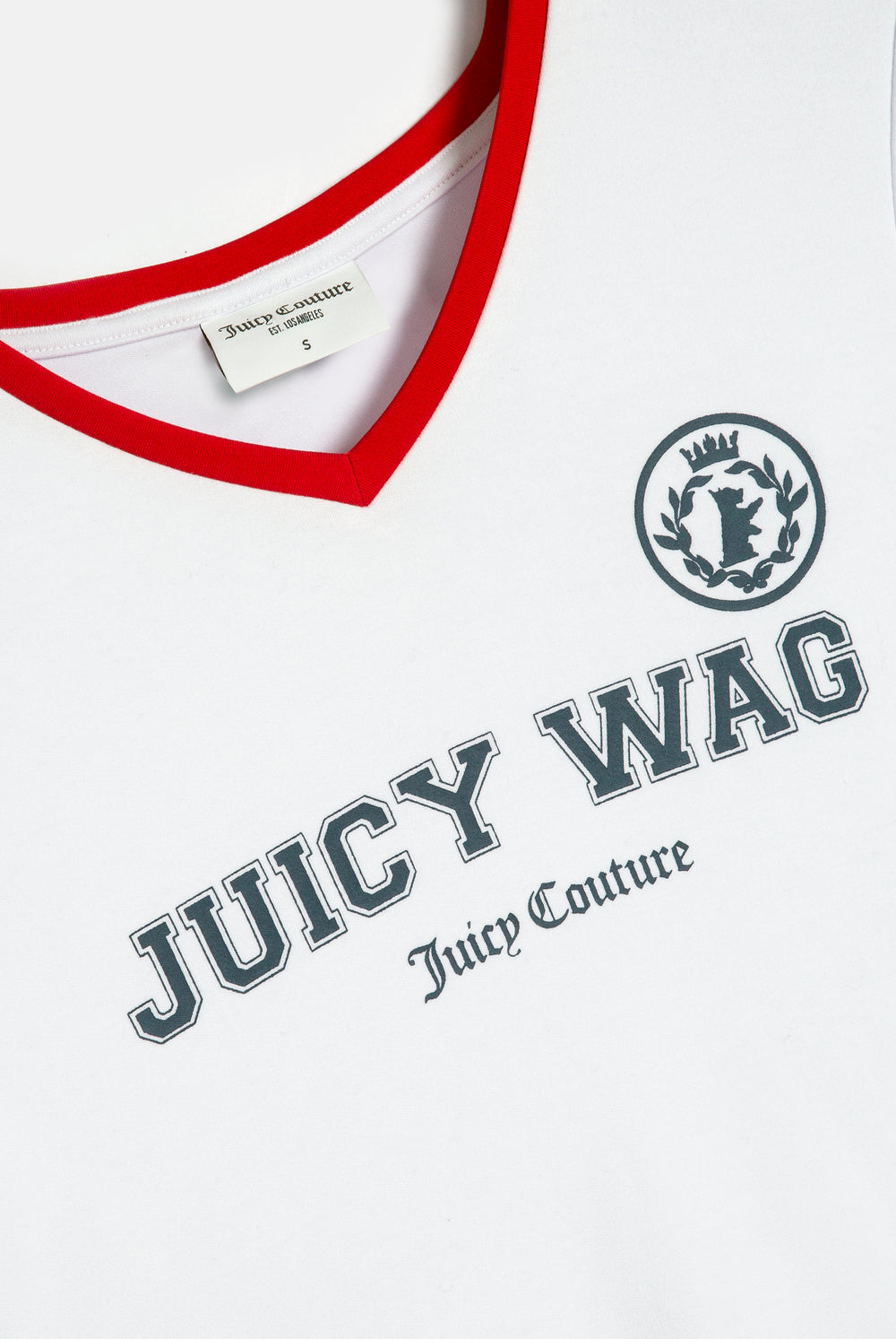 Displays a model wearing the White 'Juicy' branded Juicy Wag V Neck T-Shirt featuring the juicy wag branding 