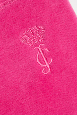 Displays the Nostalgia Pink 'juicy' branded OG straight pocketed capri pants featuring the juicy couture branding
