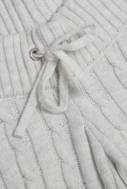 Displays the Silver Marl 'Juicy' branded Cable Knit Straight Leg Pants featuring a close up on the straw stings 