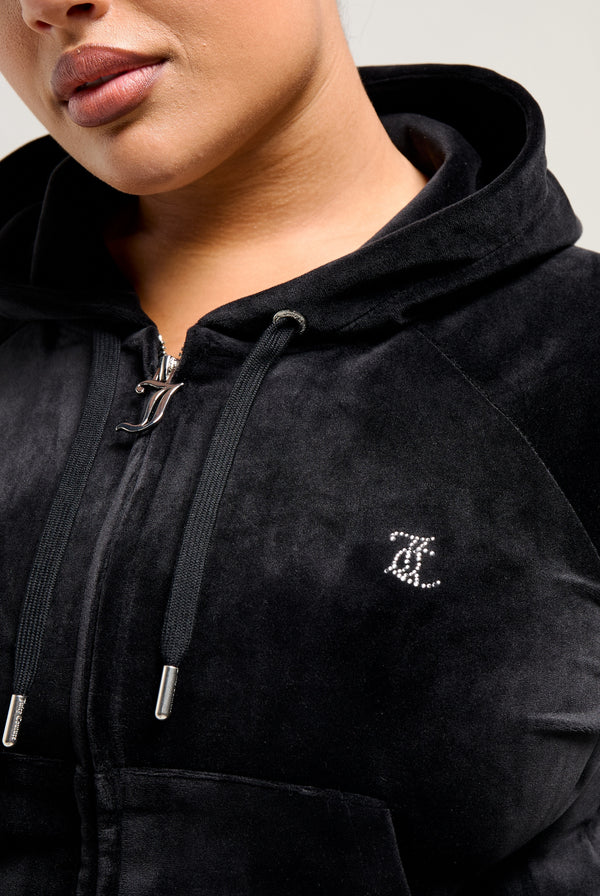Displays a model wearing the Black 'Juicy' branded 'LEO' Diamanté velour zip through hoodie 