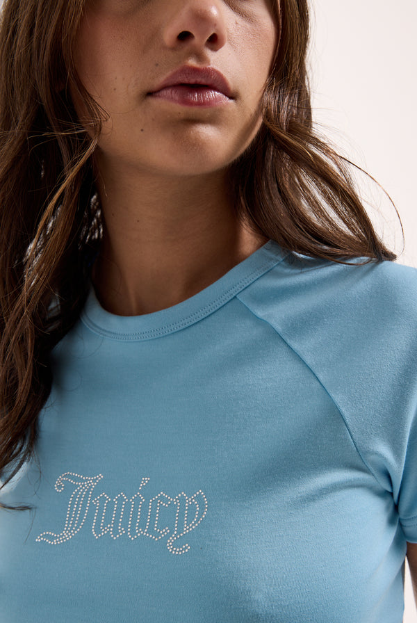Displays a model wearing the Sky Blue Raglan 'Juicy' branded diamanté baby tee 