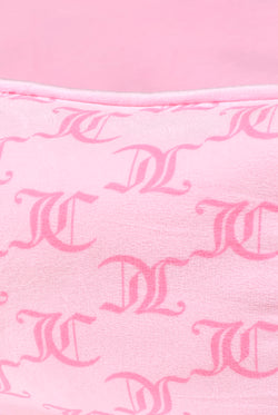 Displays the Juicy Pink 'Juicy' branded Pet Bed featuring the close up on the details 