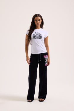 Displays a model wearing the White 'Juicy' branded Dog Crest graphic tee 