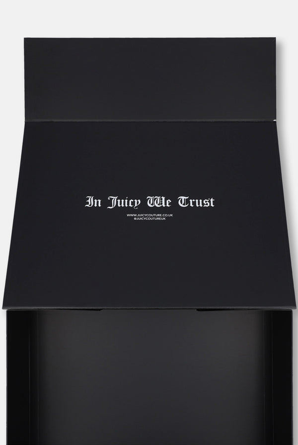 Displays the 'Juicy Couture' Gift Wrapping packaging 