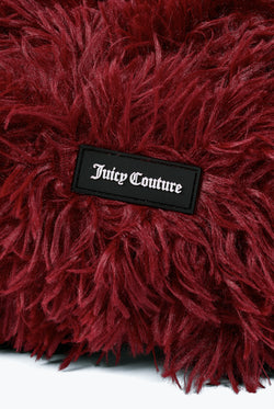 Displays the Winetasting 'Juicy' branded Fluffy Heart Pet Bed featuring the details on the juicy Couture branding 