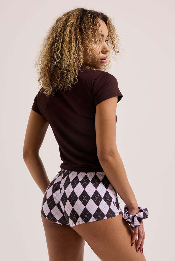 Displays a model wearing the Java 'Juicy' branded tee and shorts pyjama set 