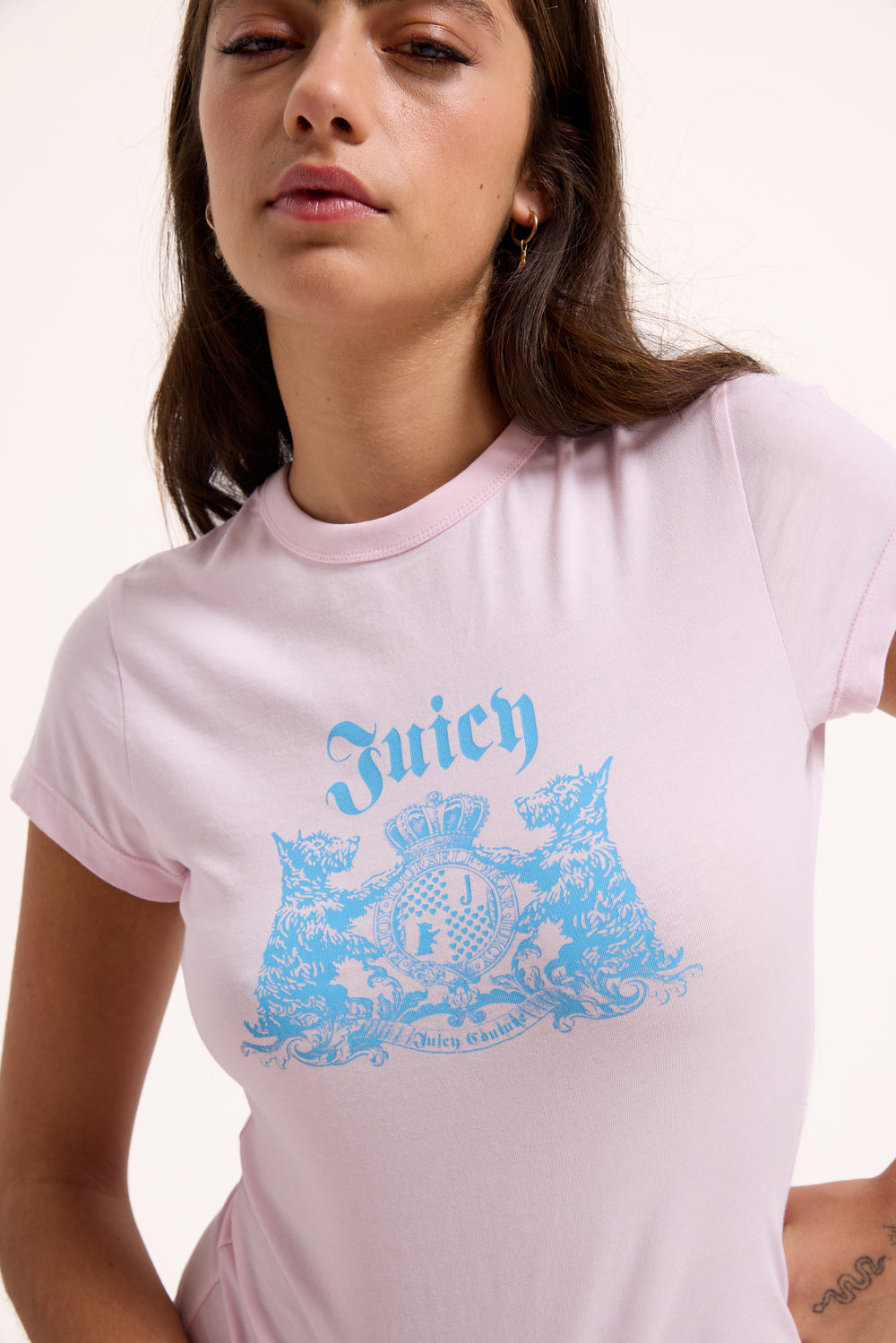 Displays a model wearing the Cherry blossom 'Juicy' branded dog crest graphic tee 
