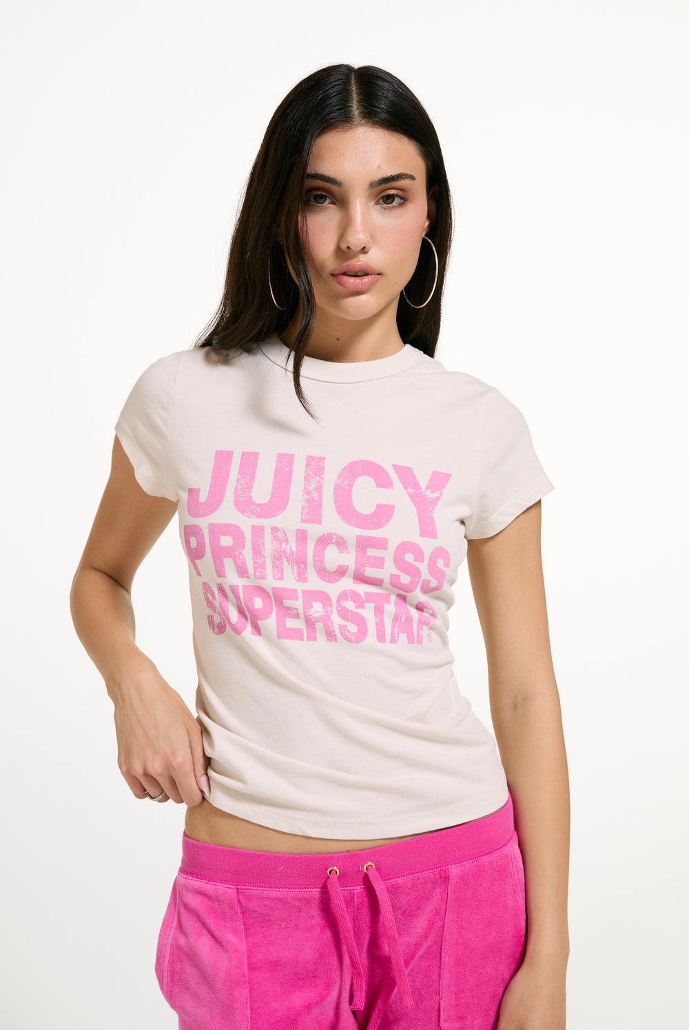 Displays a model wearing the White 'Juicy' branded Princess Superstar Washed T-Shirt