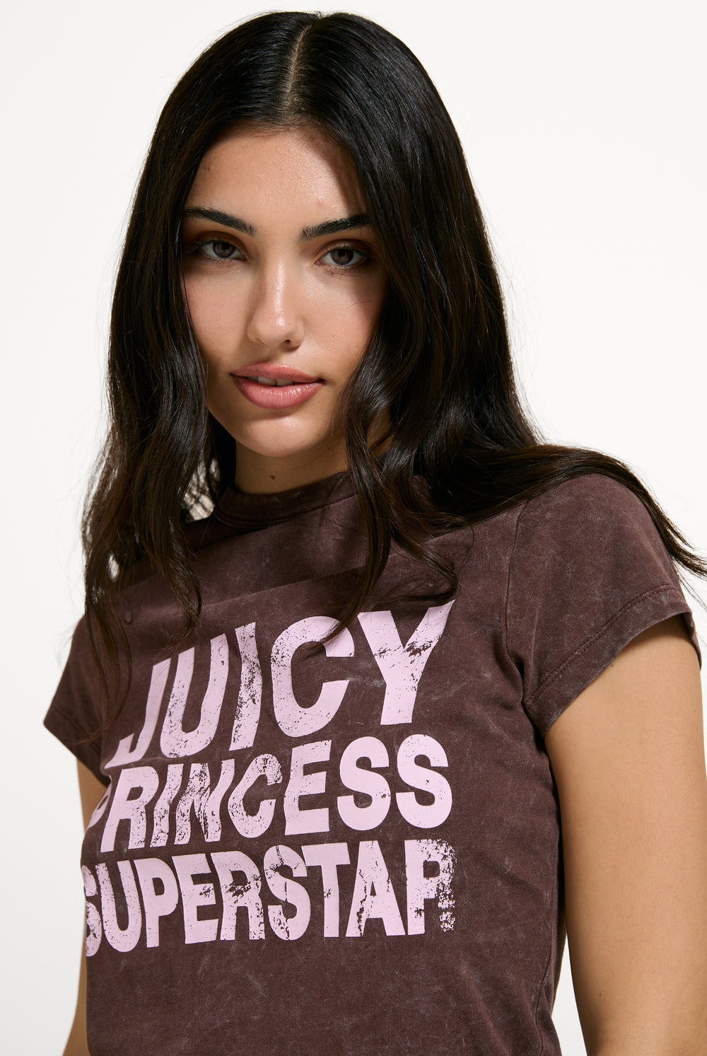 Displays a model wearing the Java 'Juicy' branding Princess Superstar Washed T-Shirt