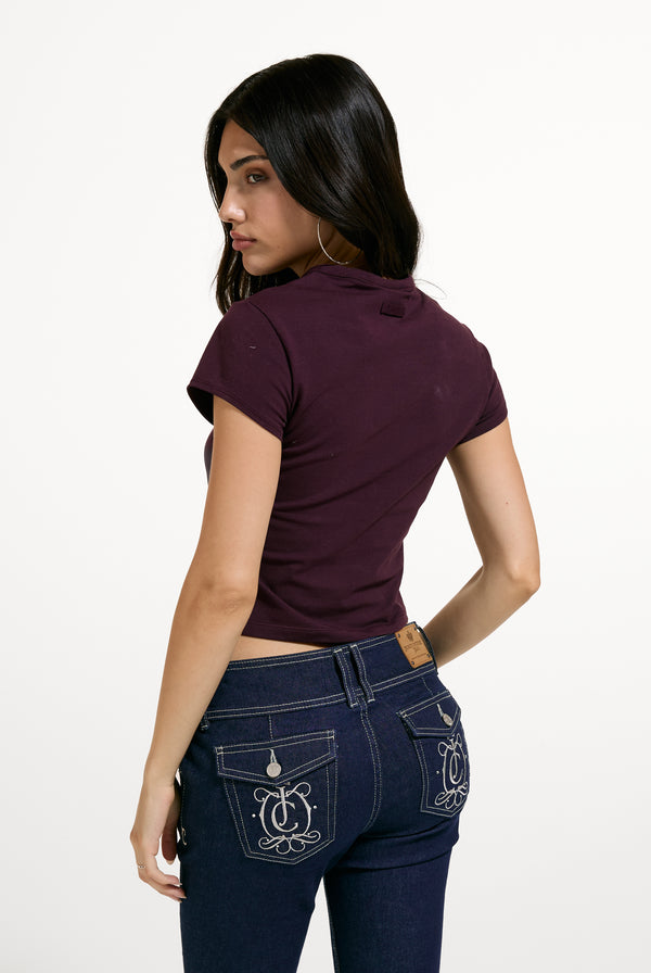 Displays a model wearing the Winetasting 'Juicy' branded Script Baby T-Shirt