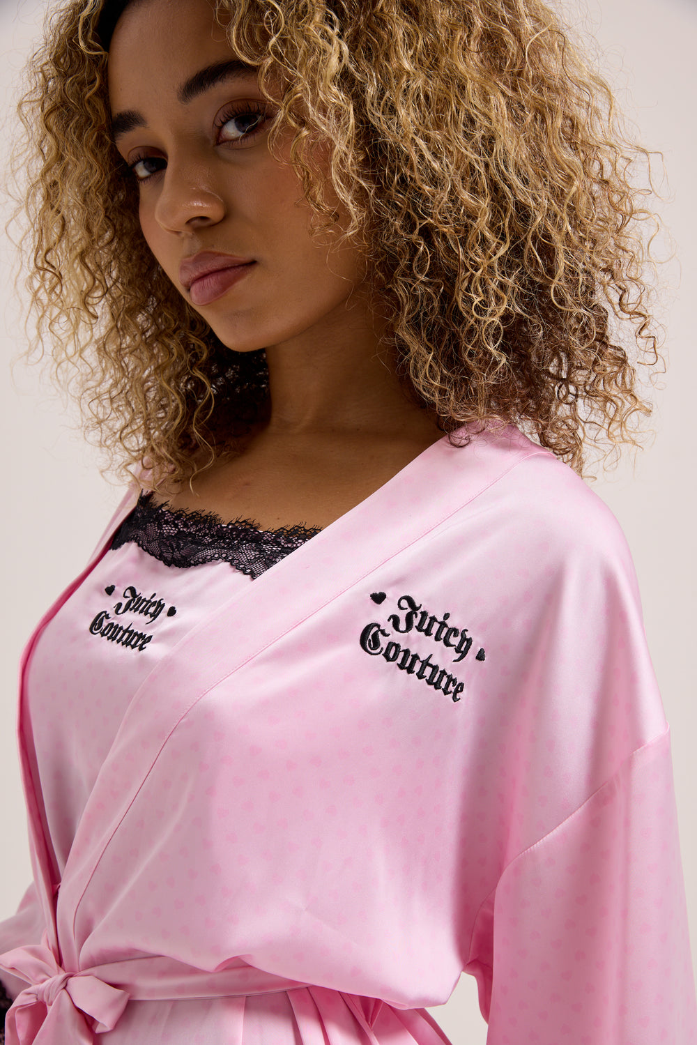 Displays a model wearing the Cherry Blossom 'Juicy' branded heart lace trim robe 